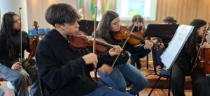 Orquestra se apresenta no 3º Fórum Municipal de Alfabetização de Santa Maria